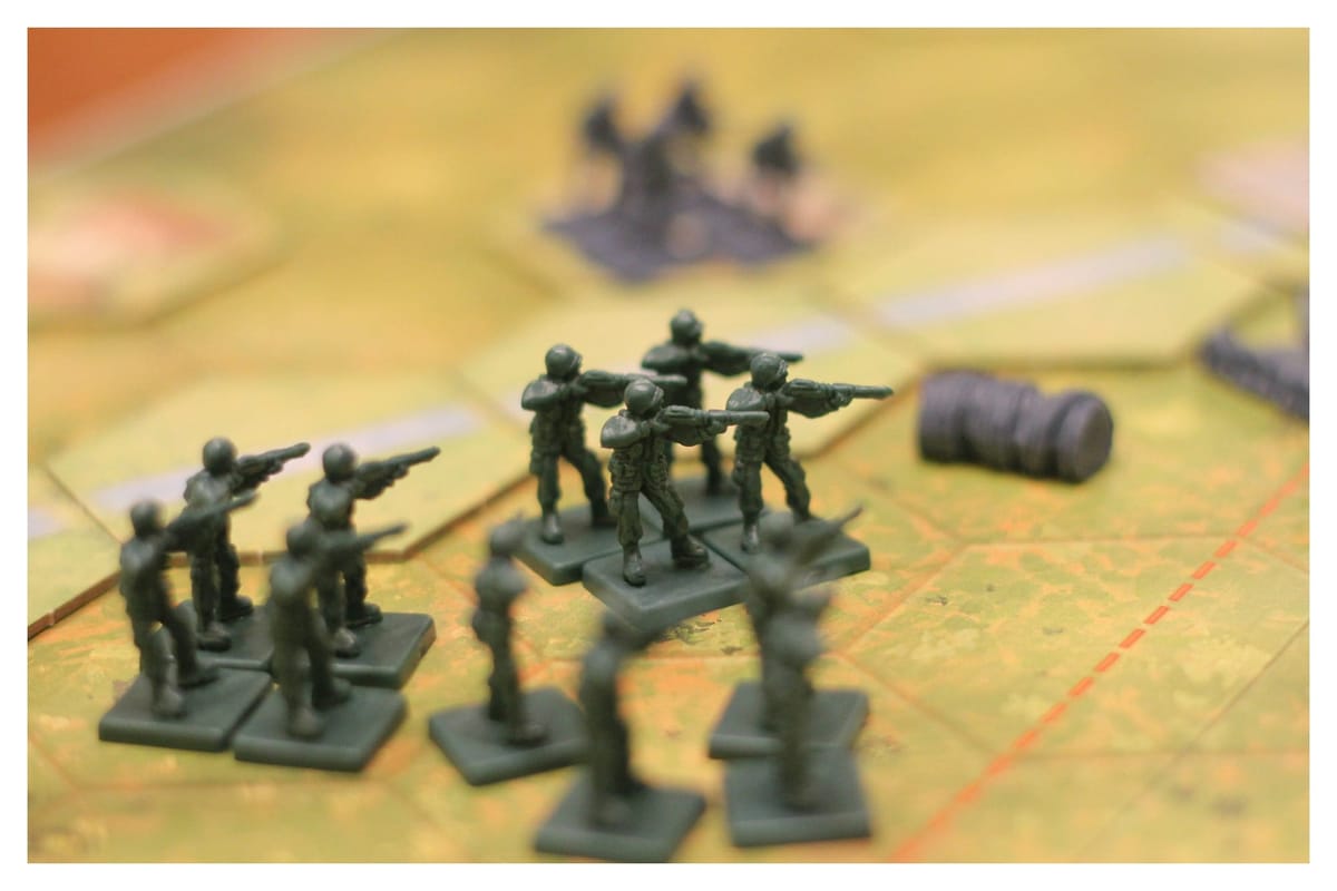 Security Theater or Theater of War? Reframing the Role of GRC