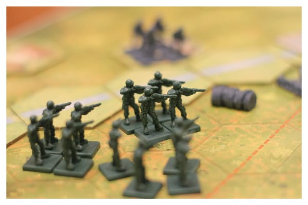 Security Theater or Theater of War? Reframing the Role of GRC